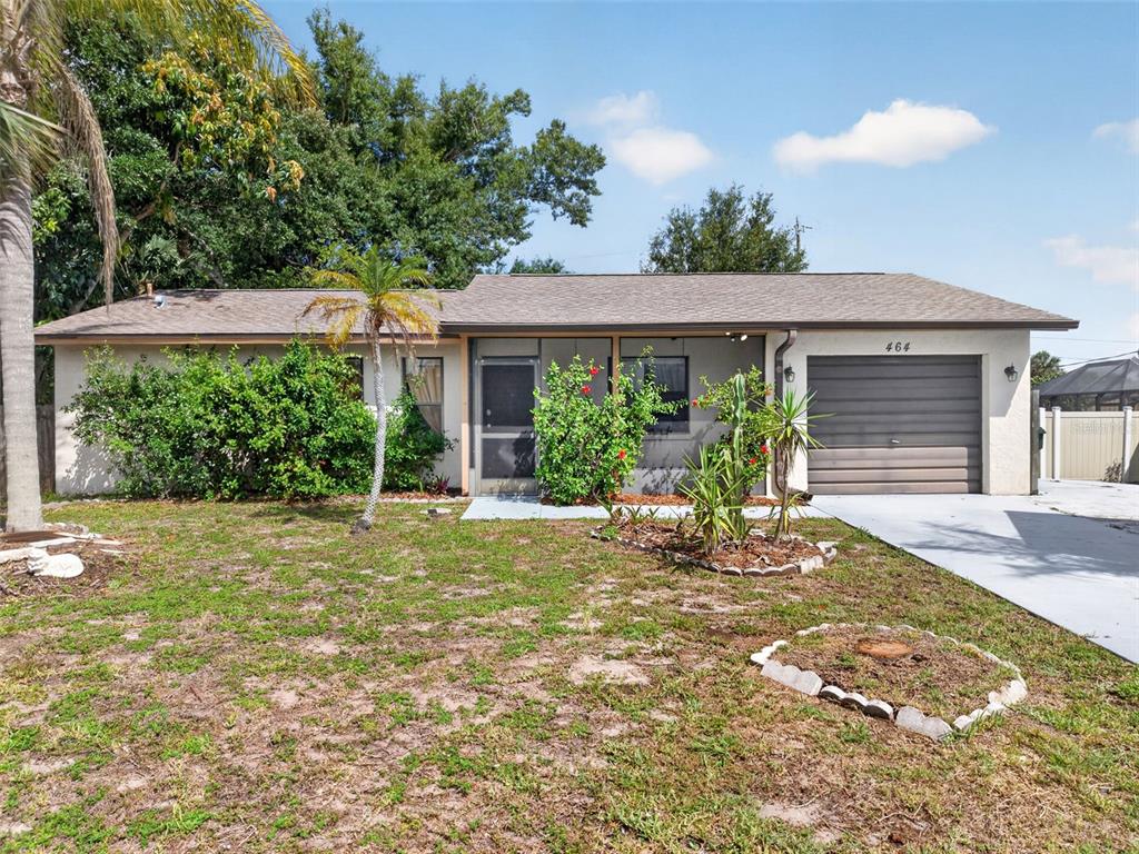 464 Coronado Road Venice, FL 34293 - Photo 27 of 28 a front view of a house with garden