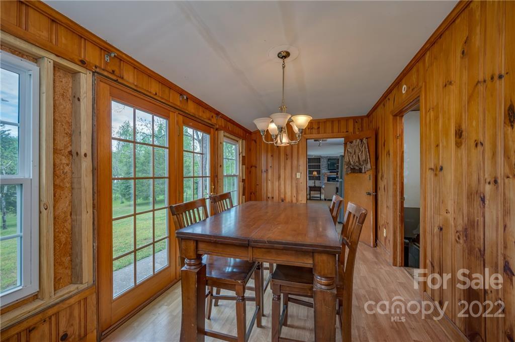 488 Elliott Road Rutherfordton, NC 28139 - Photo 17 of 44 a view of a dining room with furniture window and wooden floor