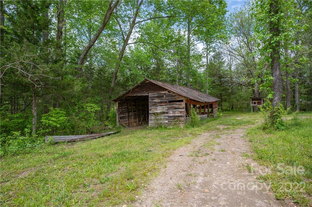 488 Elliott Road Rutherfordton, NC 28139 - Photo 30 of 44 a house with trees in the background