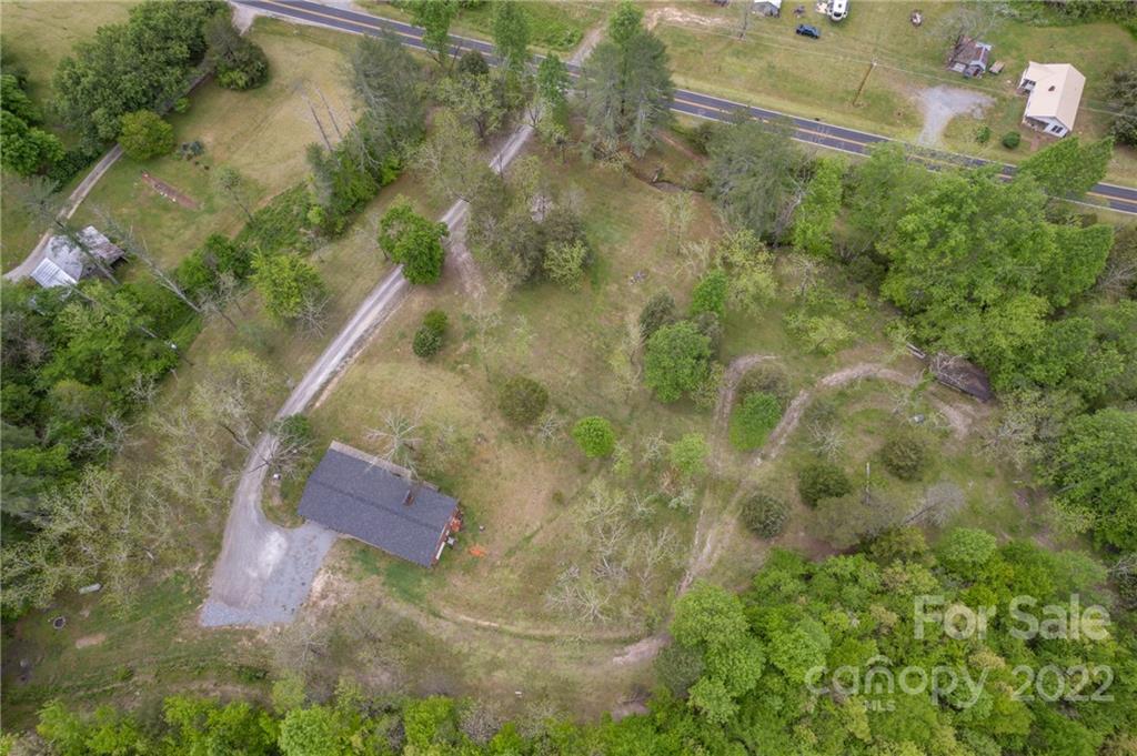 488 Elliott Road Rutherfordton, NC 28139 - Photo 35 of 44 an aerial view of residential house with outdoor space and trees all around