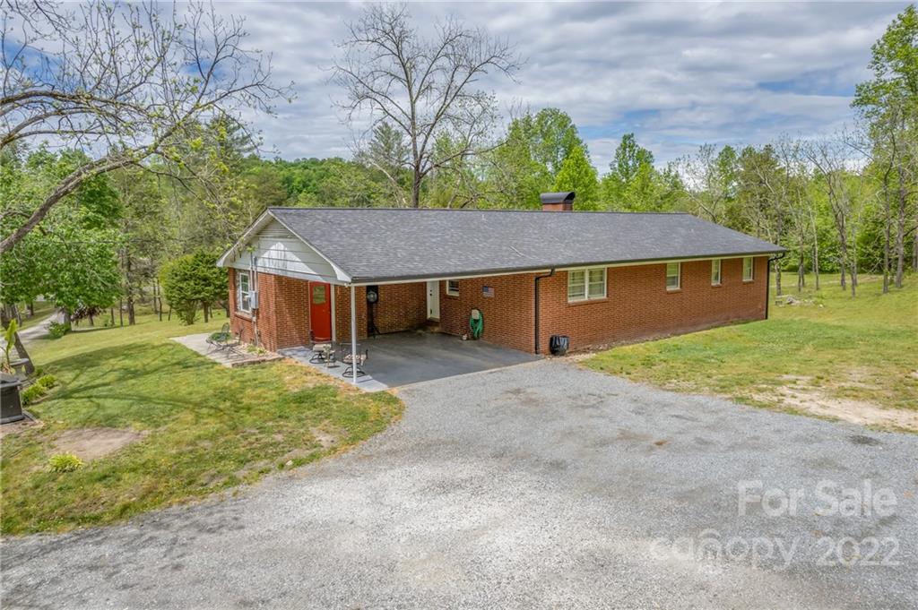 488 Elliott Road Rutherfordton, NC 28139 - Photo 4 of 44 a aerial view of a house with a yard and garage