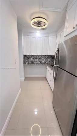 a bathroom with a tub and a shower