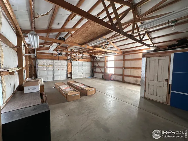 a view of a garage with furniture