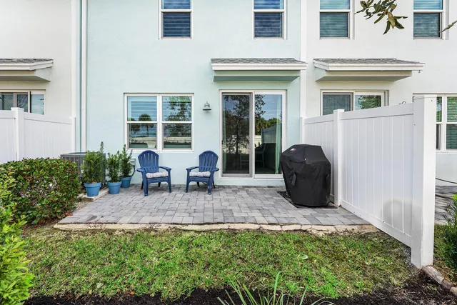 a couple of table and chairs in the yard