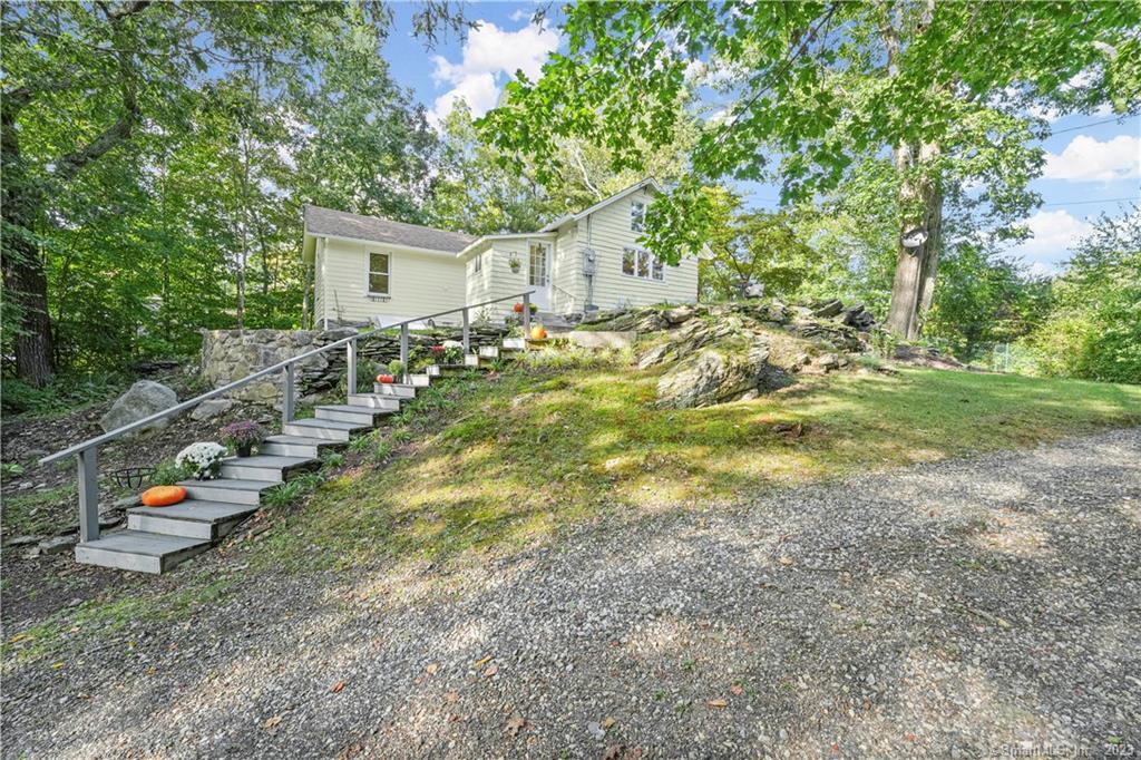 11 Mountain Road Wilton, CT 06897 - Photo 1 of 1 a view of a house with a backyard