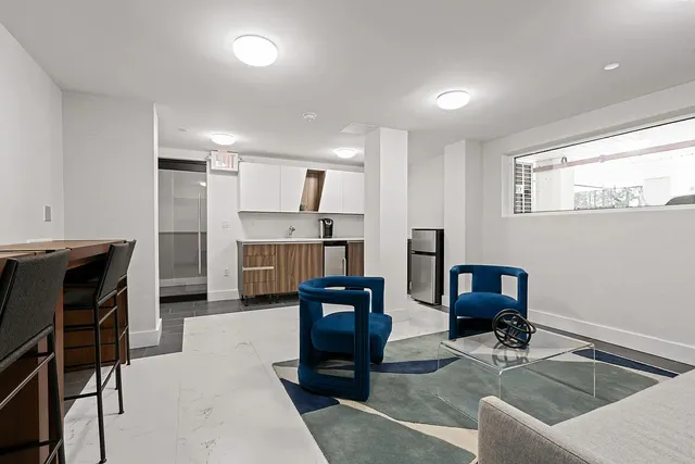 a workspace with furniture and window