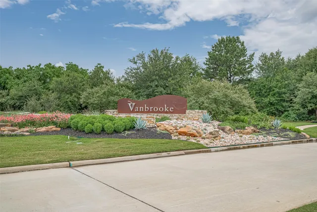 a view of a park with a slide