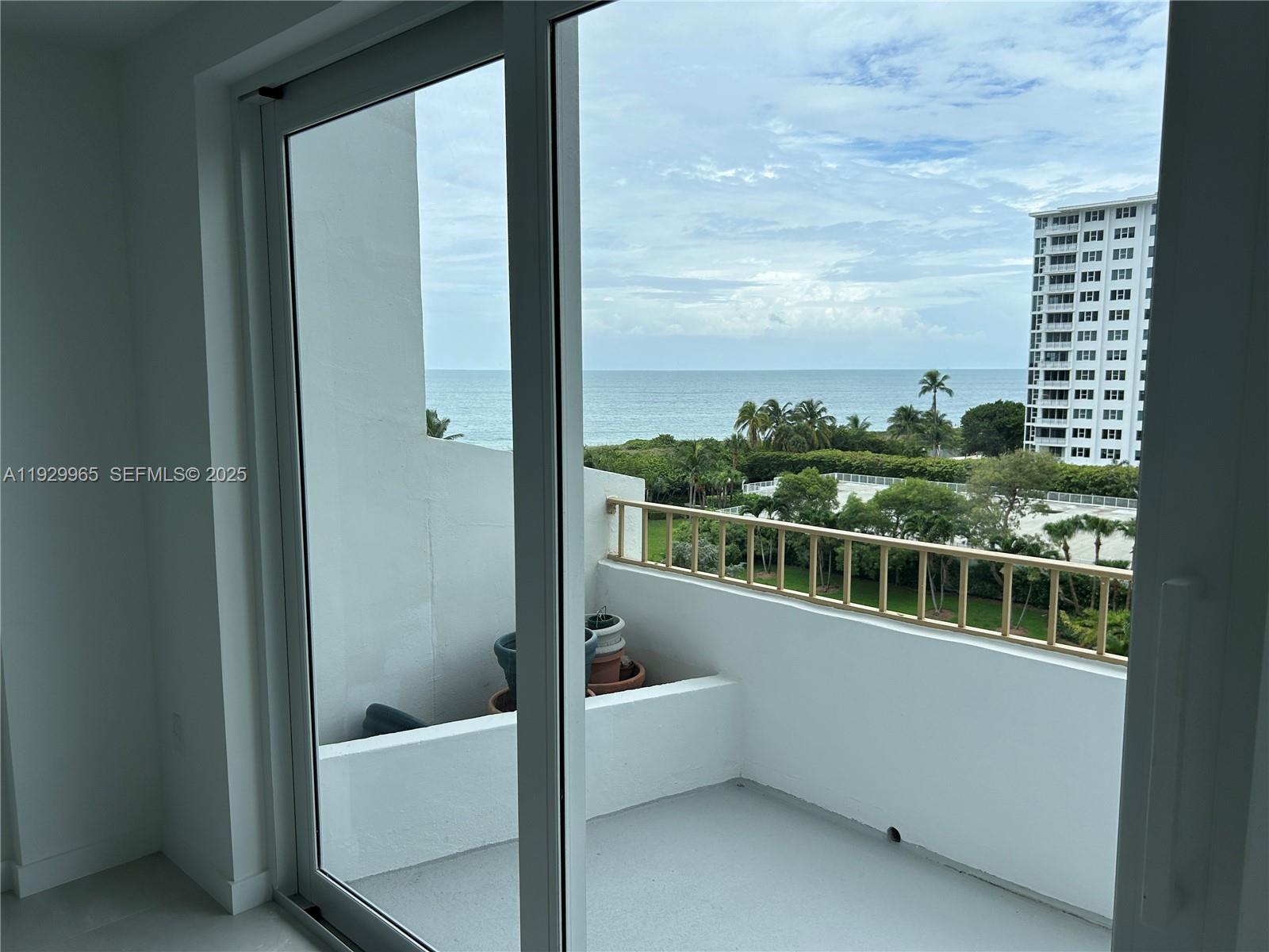 177 Ocean Ln Drive, Unit 715 Key Biscayne, FL 33149 - Photo 14 of 24 a view of a balcony with furniture