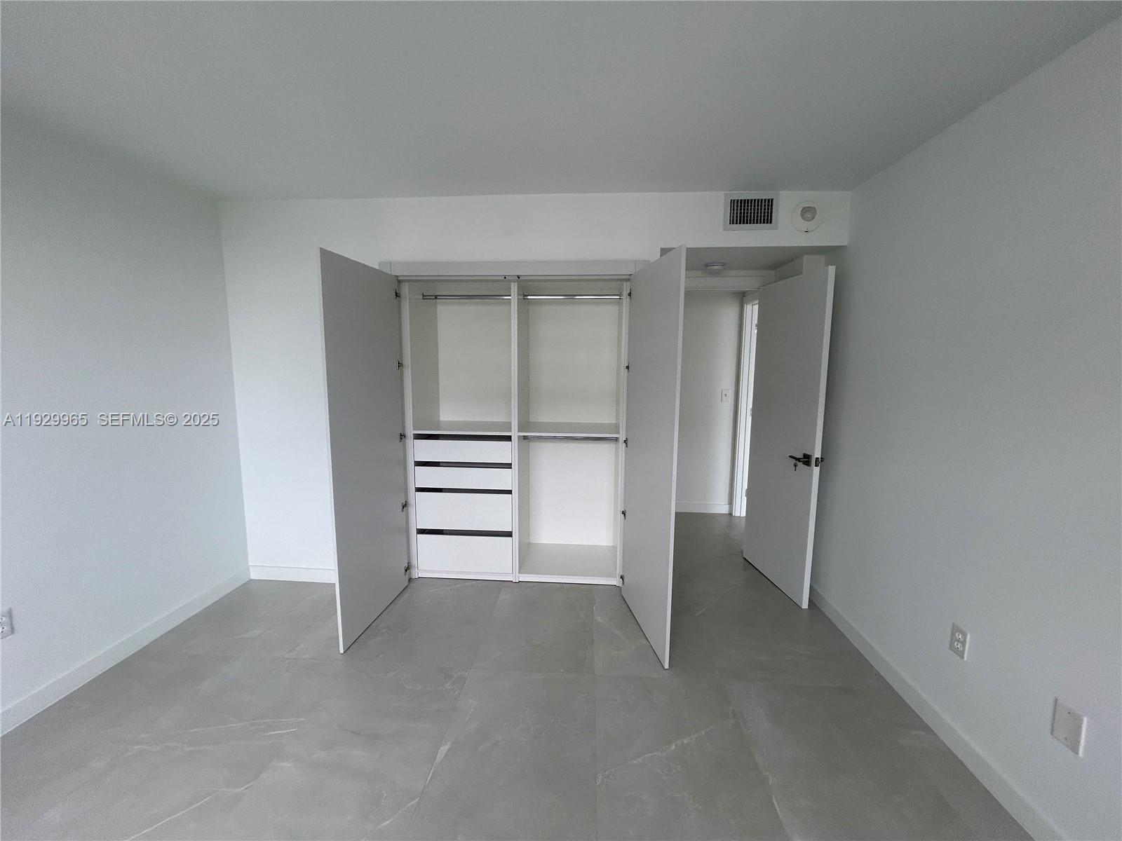 177 Ocean Ln Drive, Unit 715 Key Biscayne, FL 33149 - Photo 18 of 24 a view of closet area