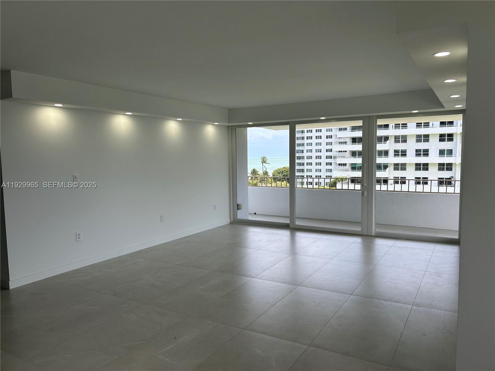 177 Ocean Ln Drive, Unit 715 Key Biscayne, FL 33149 - Photo 5 of 24 a view of an empty room with a window