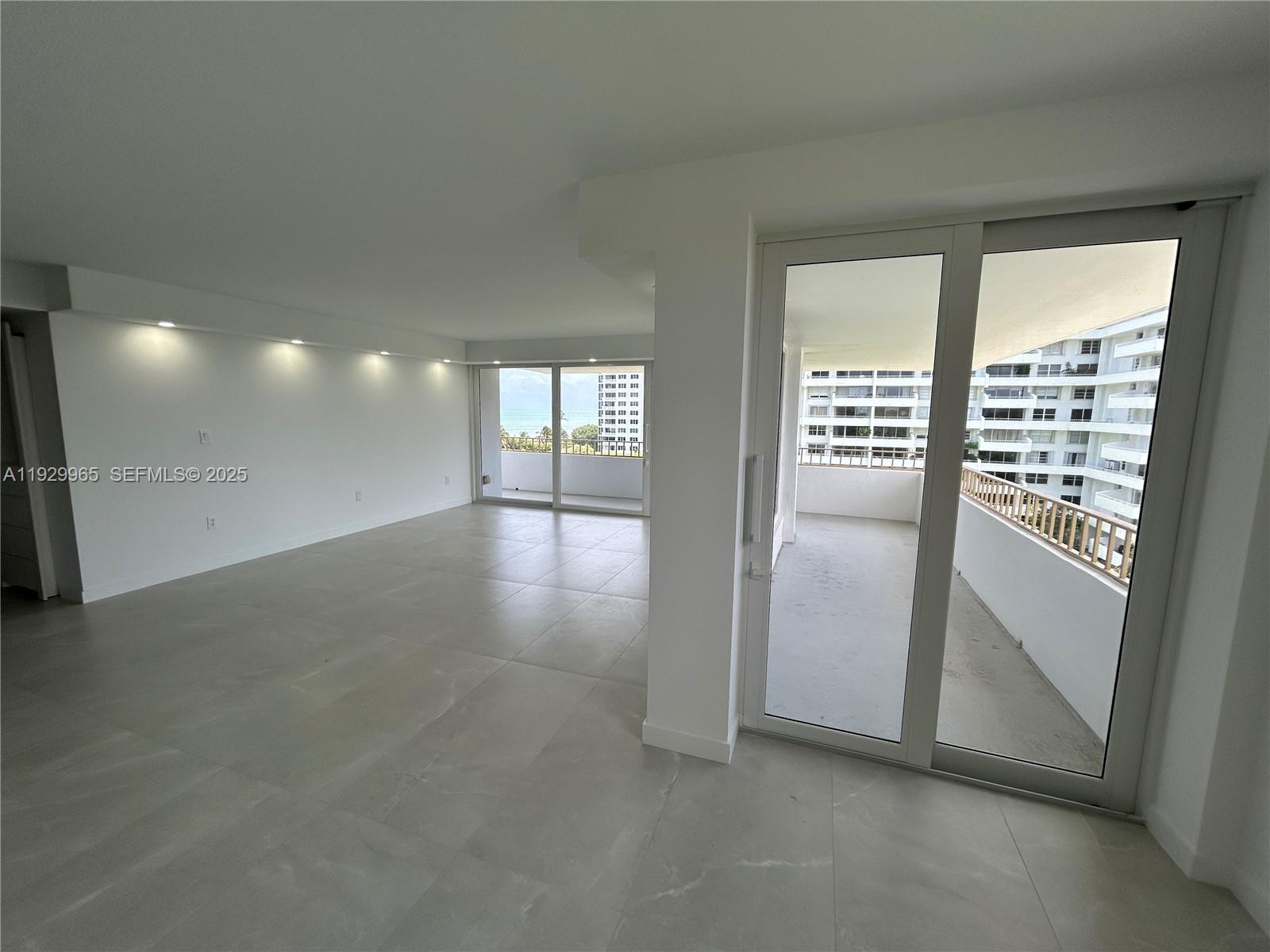 177 Ocean Ln Drive, Unit 715 Key Biscayne, FL 33149 - Photo 7 of 24 a view of an empty room with a window