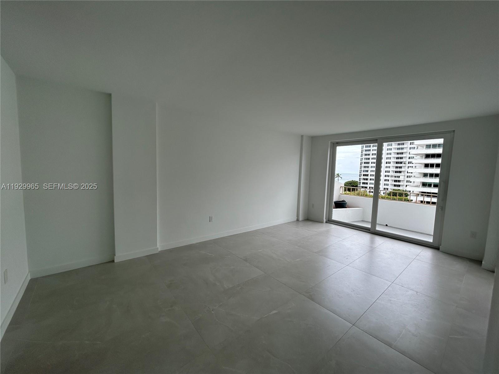 177 Ocean Ln Drive, Unit 715 Key Biscayne, FL 33149 - Photo 8 of 24 a view of an empty room with a window