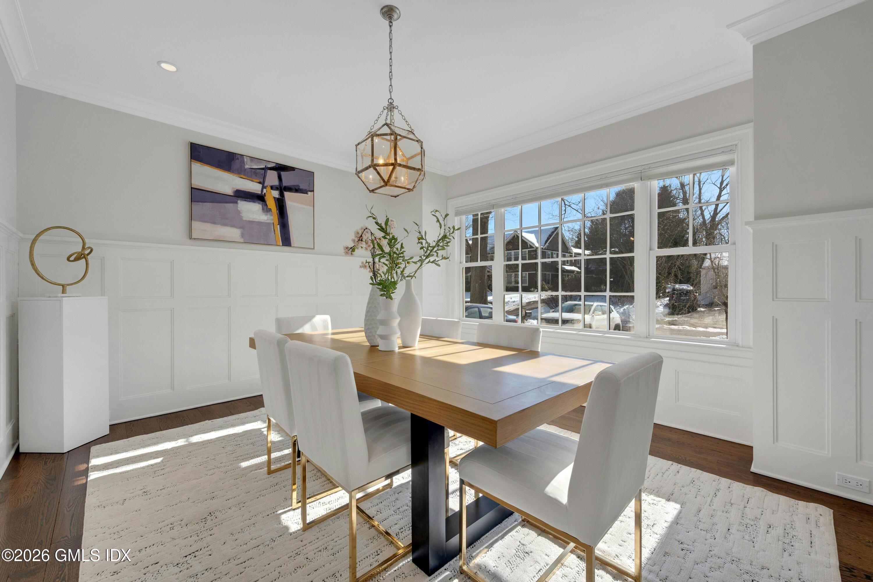 17 Pintail Lane Greenwich, CT 06830 - Photo 7 of 31 a view of a dining room with furniture window and wooden floor