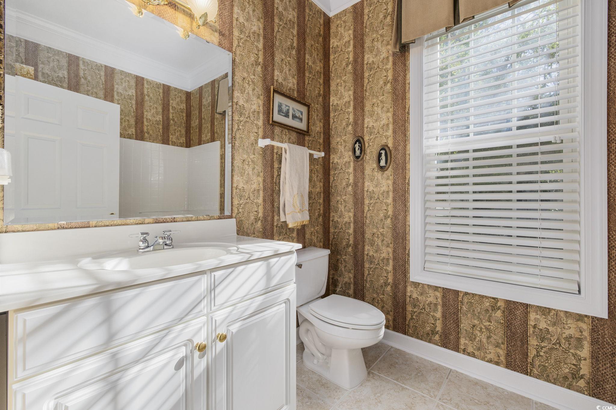 4567 Carriage Run Circle Murrells Inlet, SC 29576 - Photo 20 of 40 Bathroom featuring toilet, vanity, tile patterned