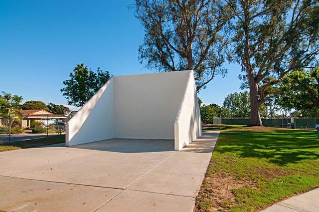 a street sign on the side of the road