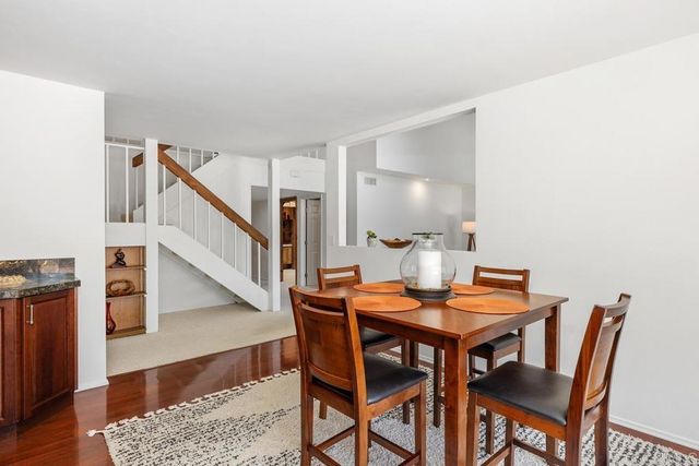 a view of a dining room with furniture