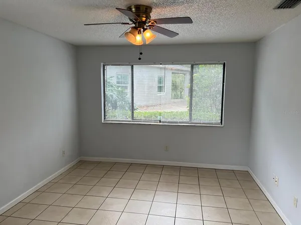 a view of an empty room with window