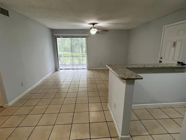 a view of an empty room and window