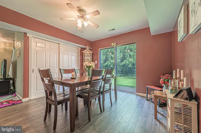 a bed room with furniture and a window