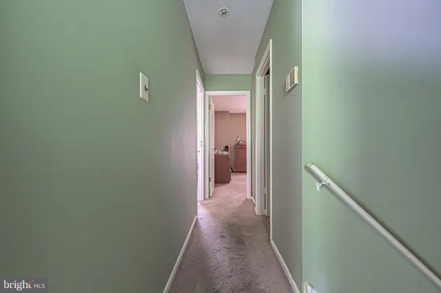 a bedroom with furniture and a wooden floor