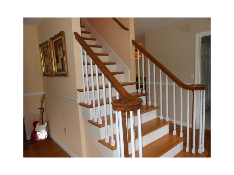 115 Taylor Road Portsmouth, RI 02871 - Photo 10 of 25 Other. Lovely staircase in front foyer
