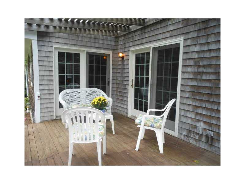 115 Taylor Road Portsmouth, RI 02871 - Photo 22 of 25 Patio/Deck. Enjoy a peaceful time on your back deck - right off french doors from kitchen and family room