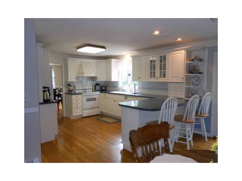 115 Taylor Road Portsmouth, RI 02871 - Photo 3 of 25 Kitchen. Spacious and sunny kitchen with lots of counter space. Plenty of room for a kitchen table too!