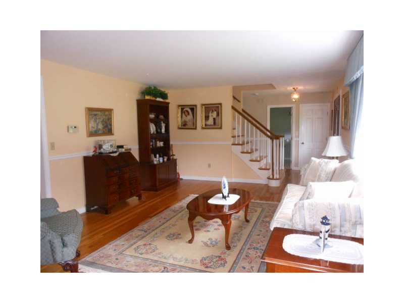 115 Taylor Road Portsmouth, RI 02871 - Photo 7 of 25 Living Room. Gracious living room with lovely hardwood floors