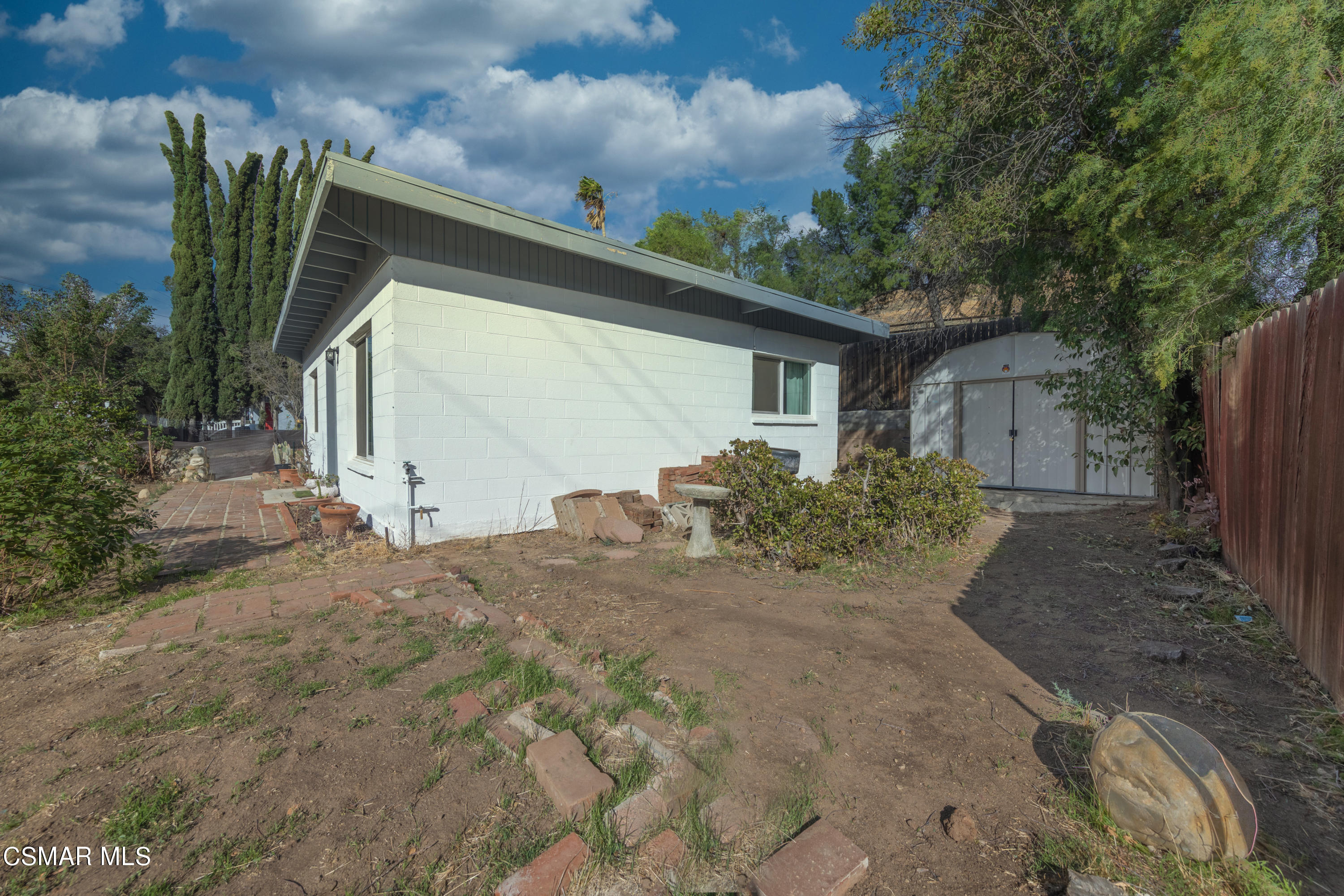 5935 Oak Knolls Road Simi Valley, CA 93063 - Photo 22 of 24 a view of a house with a yard