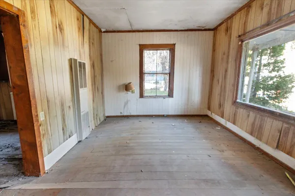 an empty room with windows