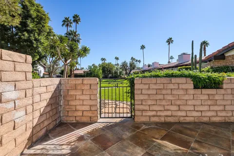 a view of a hallway with a livingroom
