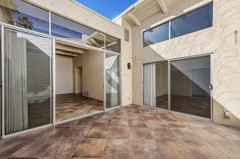 a kitchen with stainless steel appliances a refrigerator and a sink