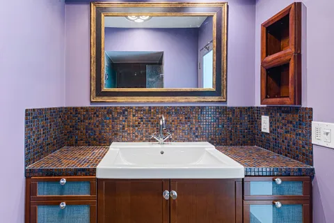 a view of a room with a fan