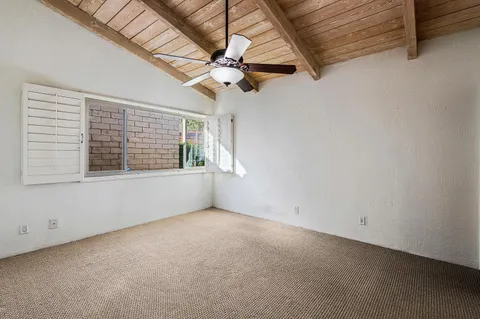 an aerial view of residential house and mountain view