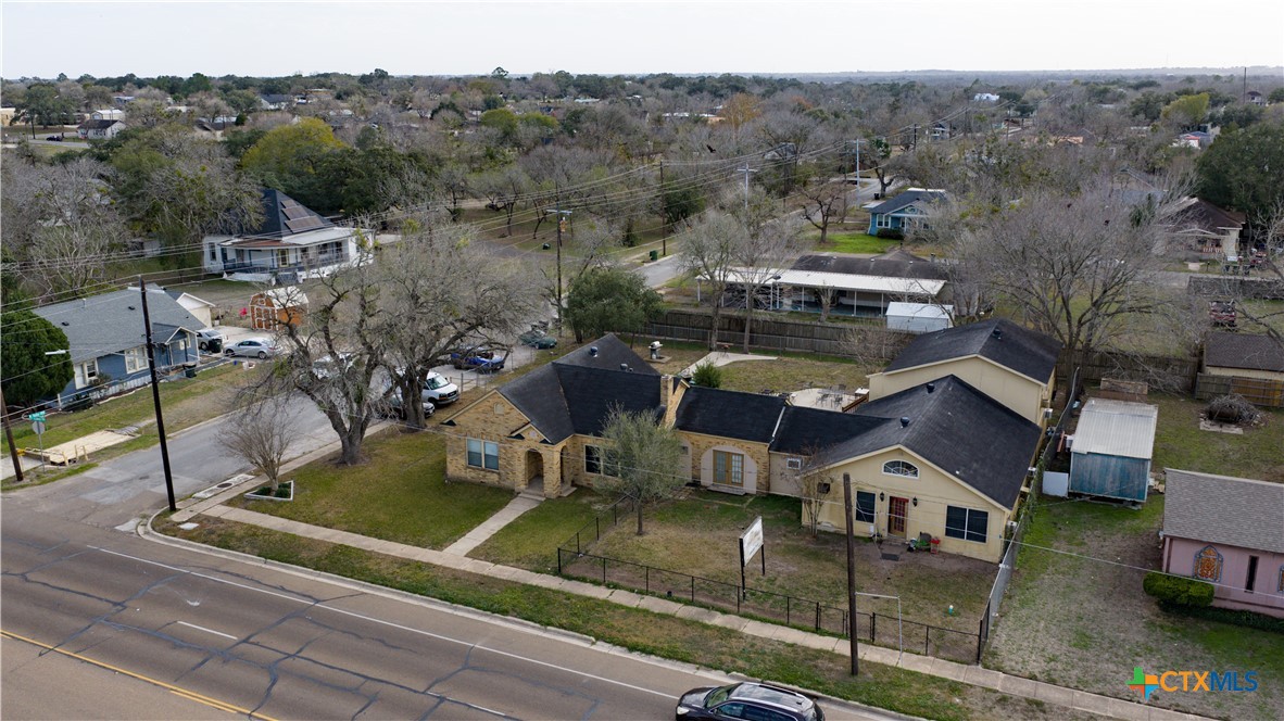 613 East Broadway Street, Unit 5 Cuero, TX 77954 - Photo 30 of 34 an aerial view of house with yard