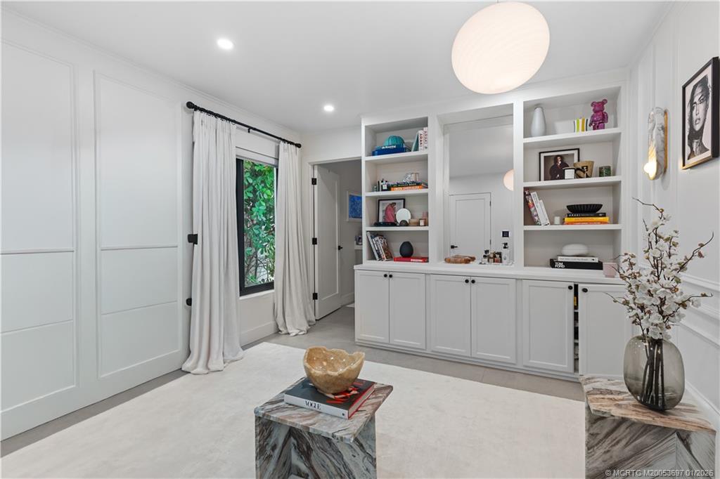 5143 Deerhurst Crescent Circle Boca Raton, FL 33486 - Photo 18 of 47 a living room with furniture and potted plant