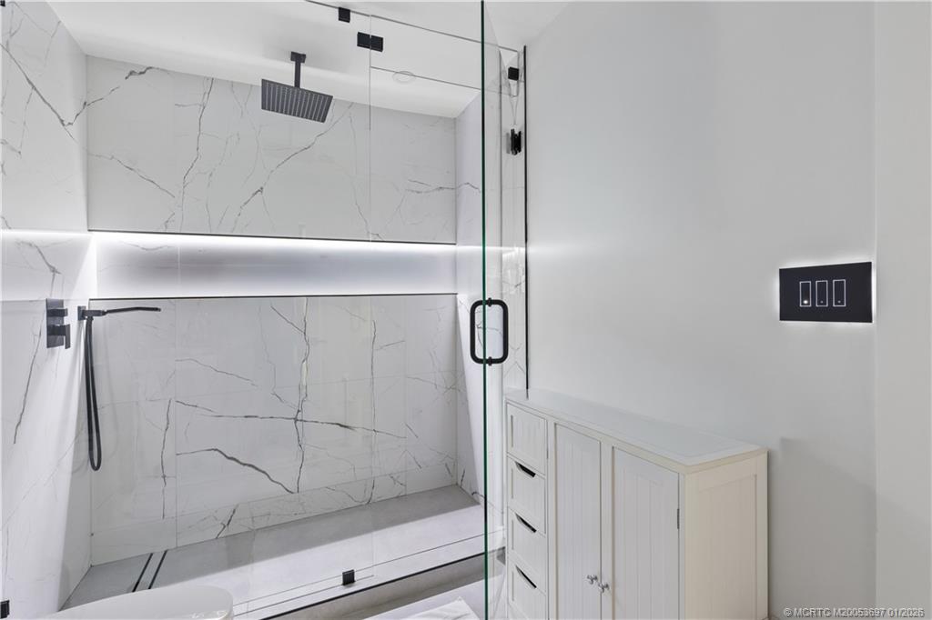 5143 Deerhurst Crescent Circle Boca Raton, FL 33486 - Photo 21 of 47 a bathroom with a shower