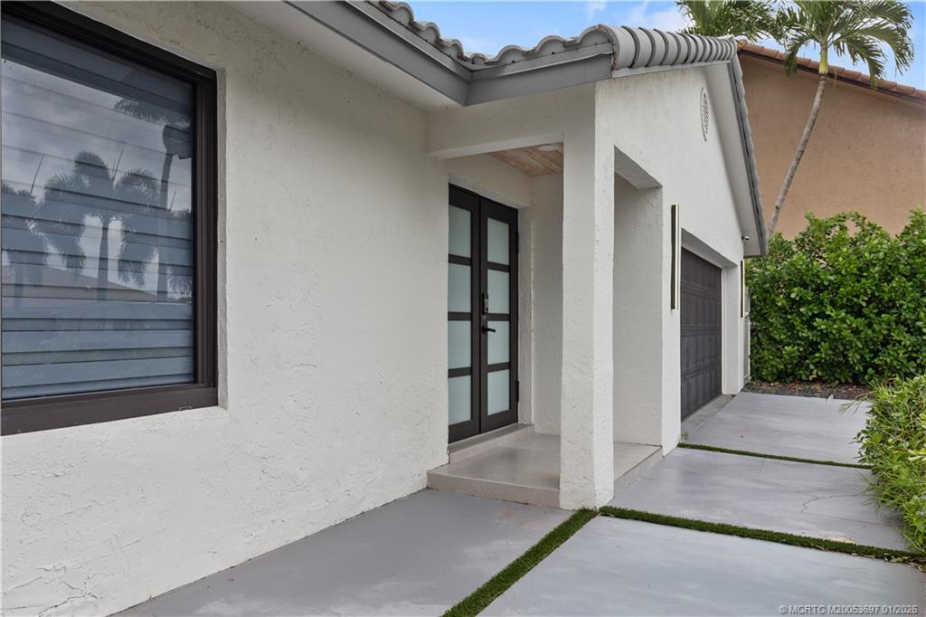 5143 Deerhurst Crescent Circle Boca Raton, FL 33486 - Photo 34 of 47 a view of front door