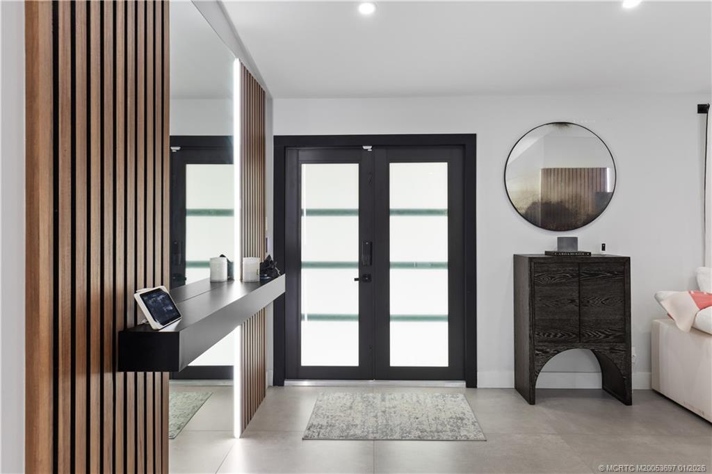 5143 Deerhurst Crescent Circle Boca Raton, FL 33486 - Photo 4 of 47 a front view of a house