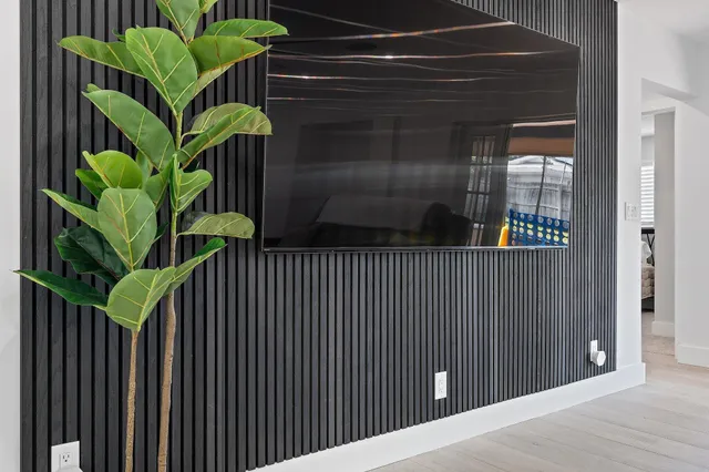 a view of a garden from a corridor