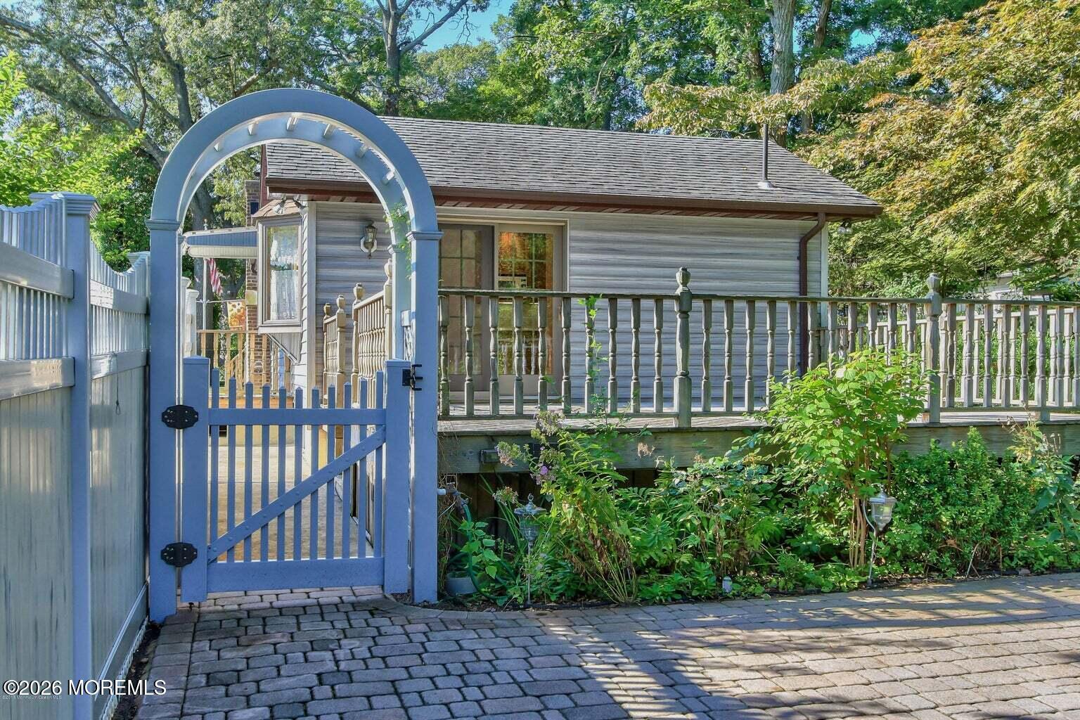 331 Morris Boulevard Toms River, NJ 08753 - Photo 22 of 33 a front view of a house with garden