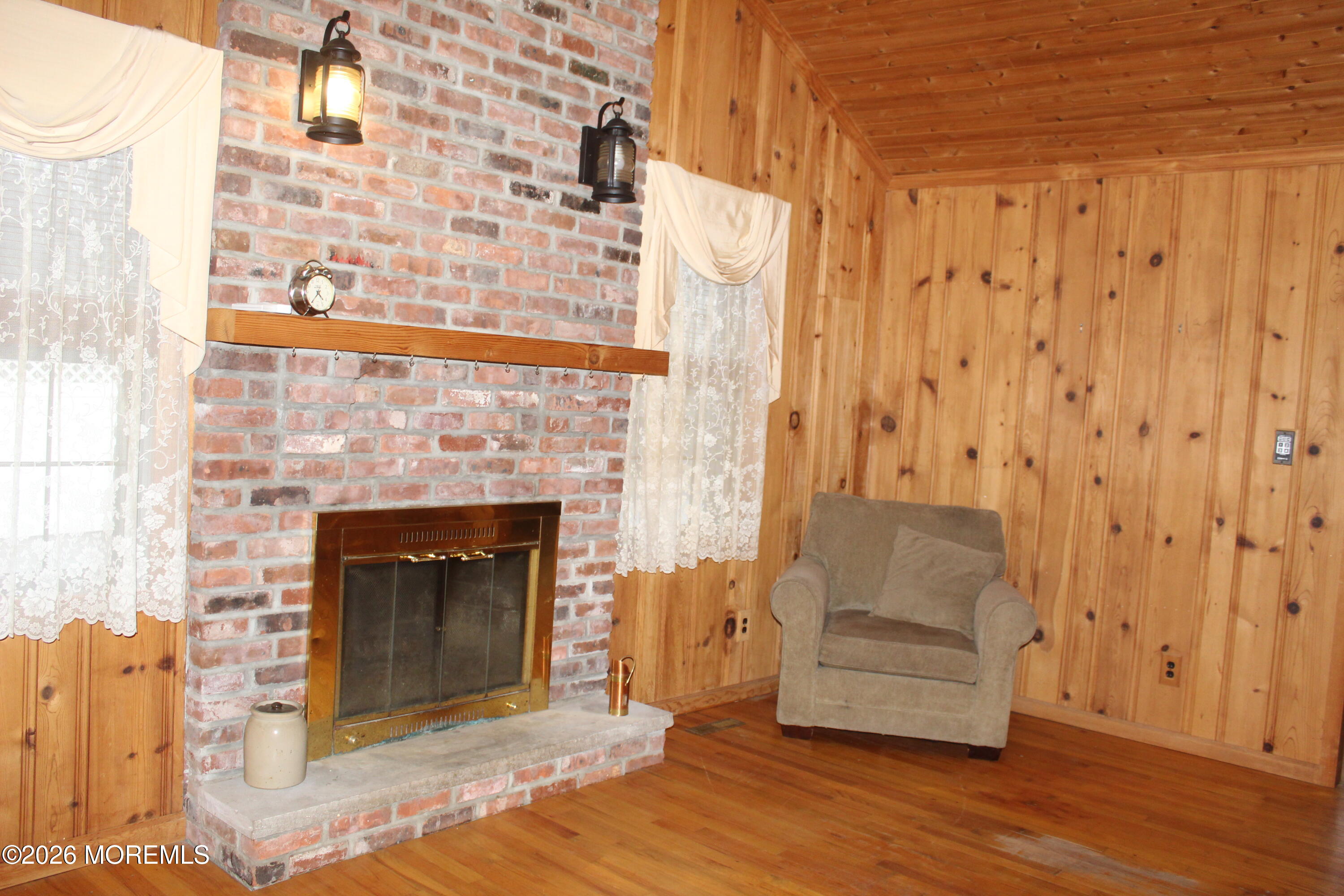331 Morris Boulevard Toms River, NJ 08753 - Photo 6 of 33 a living room with furniture and a fireplace