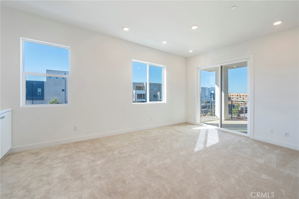 121 Baluster Irvine, CA 92618 - Photo 25 of 80 a view of an empty room with a window