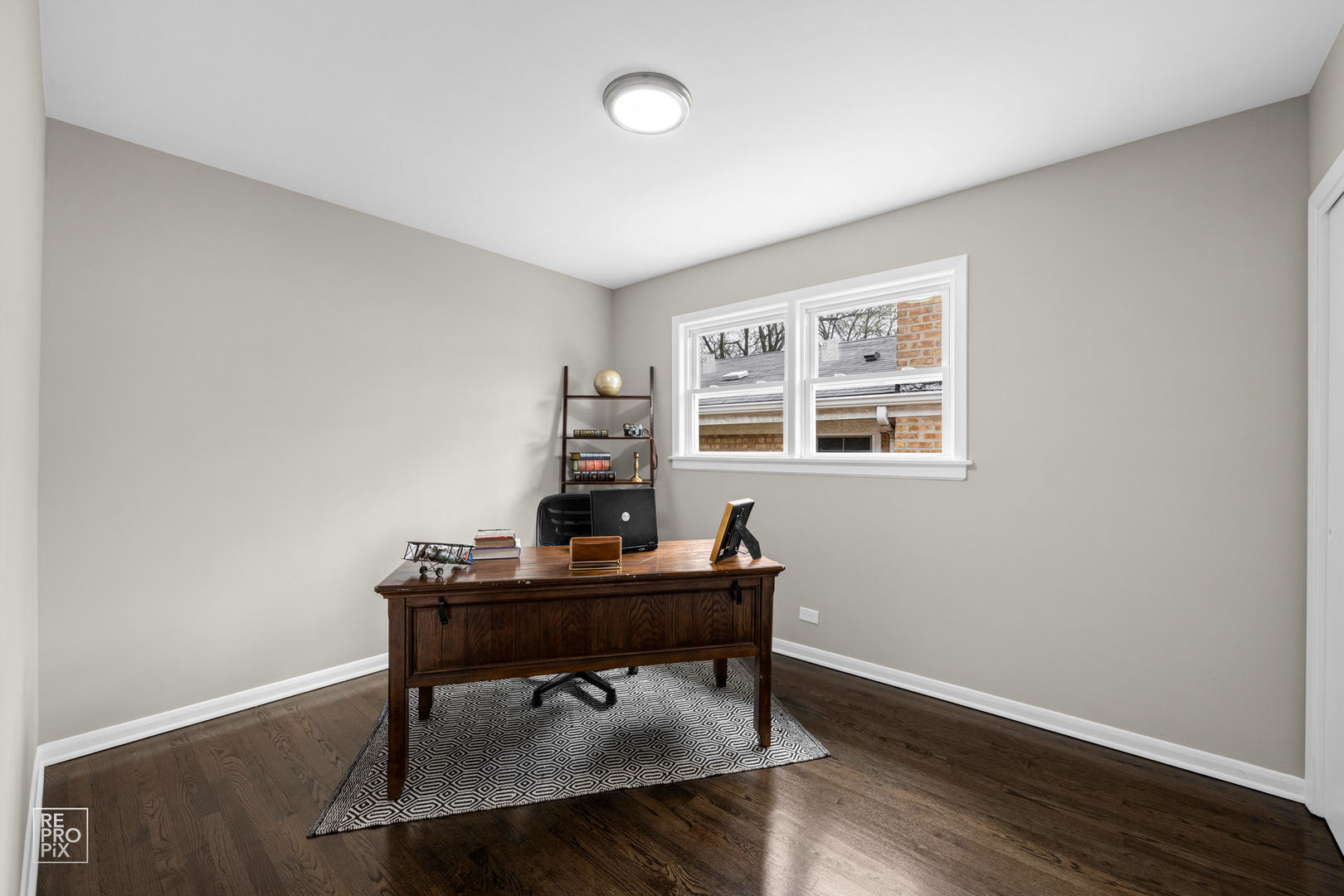 4319 West Devon Avenue Chicago, IL 60646 - Photo 7 of 10 a view of a workspace with furniture