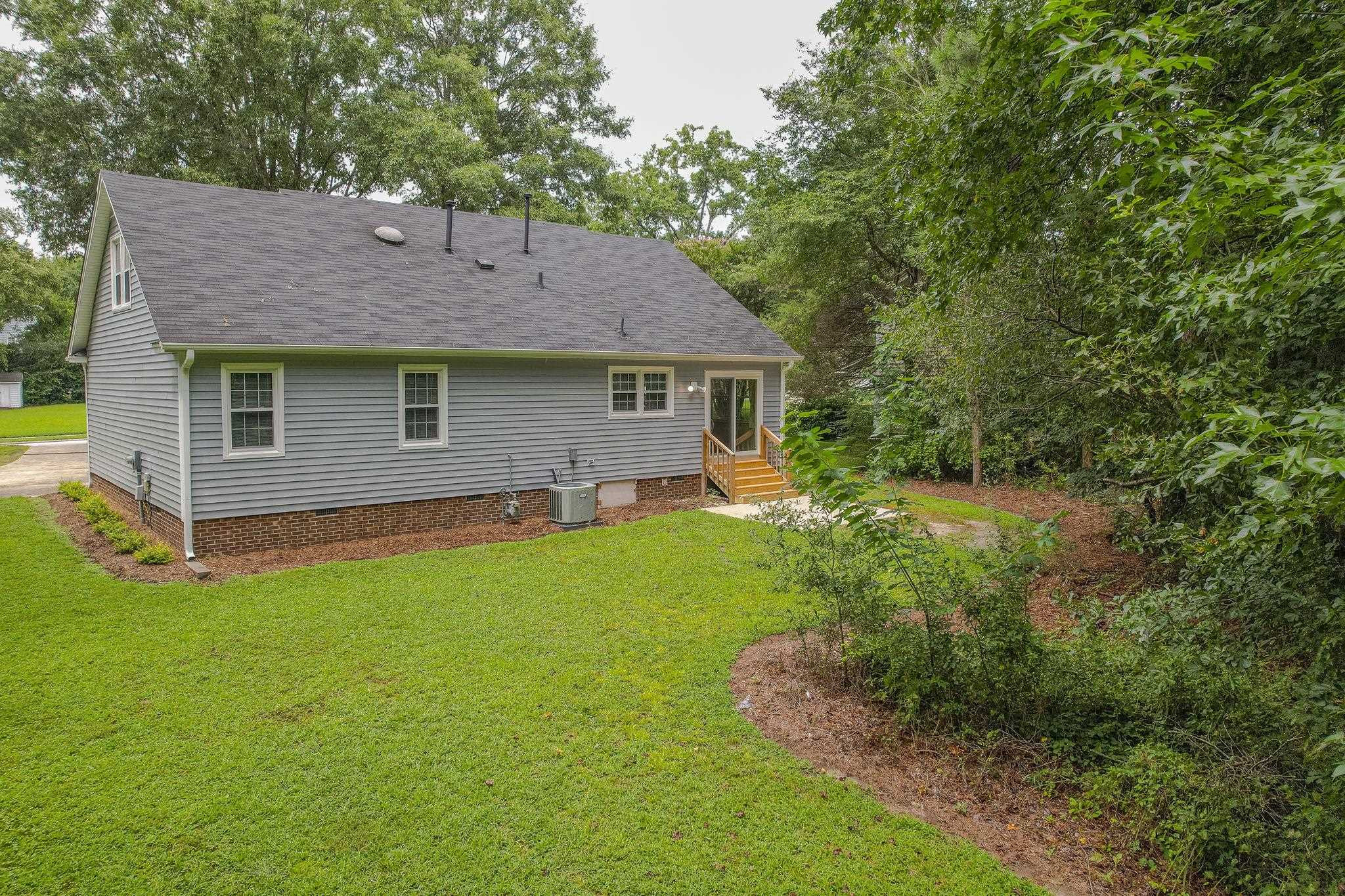 1609 Maybrook Drive Raleigh, NC 27610 - Photo 21 of 24 Large level yard