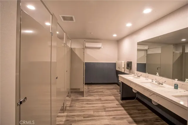 a room with gym equipment and a mirror