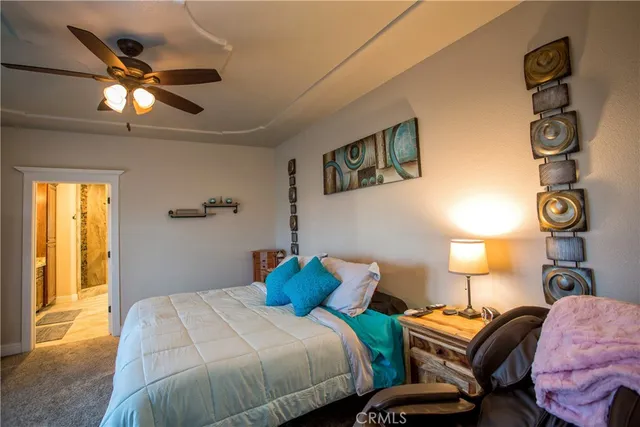a kitchen with a sink cabinets and appliances