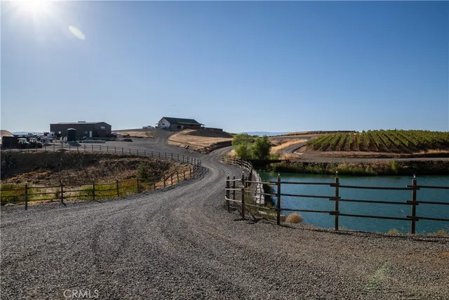 a view of a chairs and table in the patio