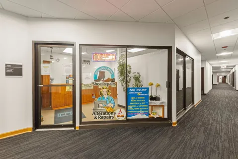 a view of an entryway with wooden floor