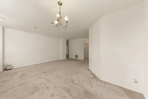 a view of a chandelier in big room